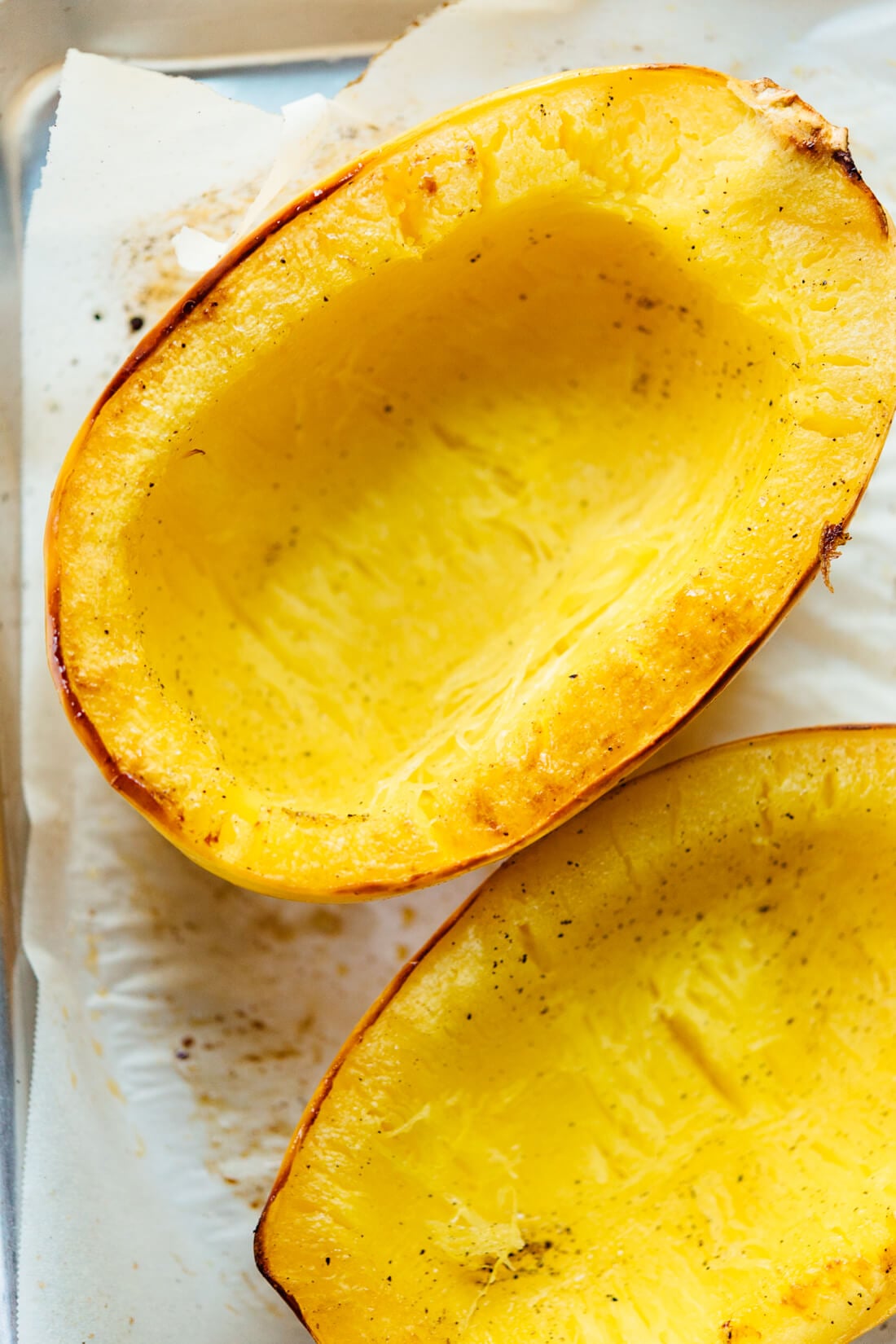 best way to cook spaghetti squash - halved, seeds scooped out, baked cut side down, with olive oil and salt!