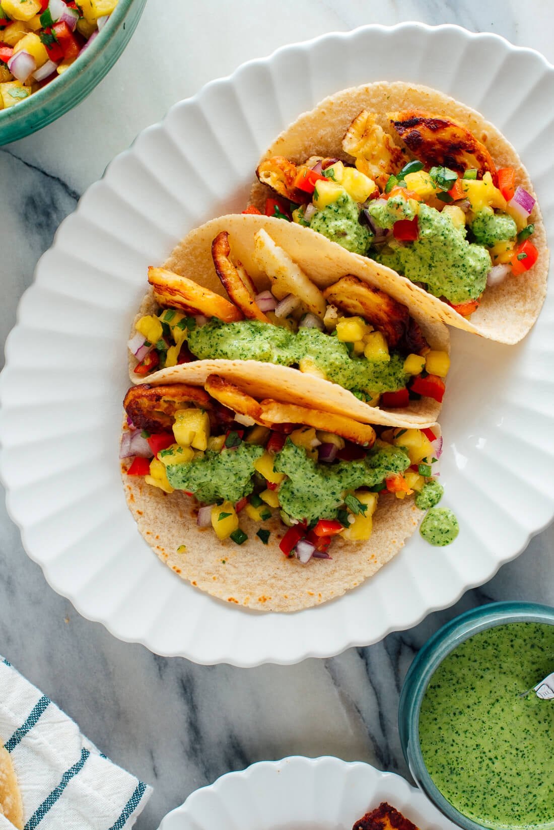 aji verde drizzled on tacos